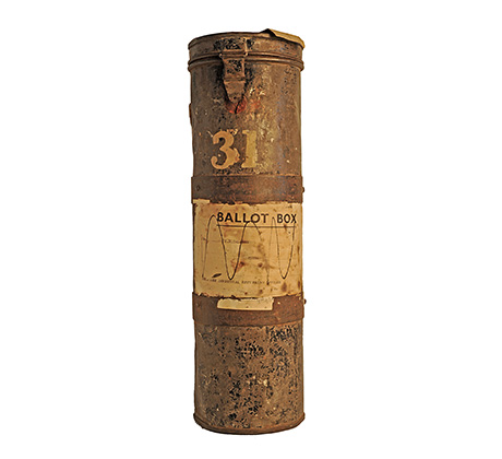 Leather tube with white stickers and the number '31' attached to the outside